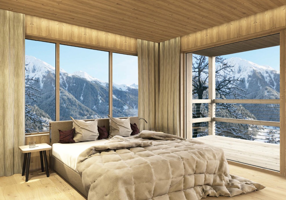 Kuscheliges Bett mit Berpanorama, große Fenster- Apartments & Chalet Selm